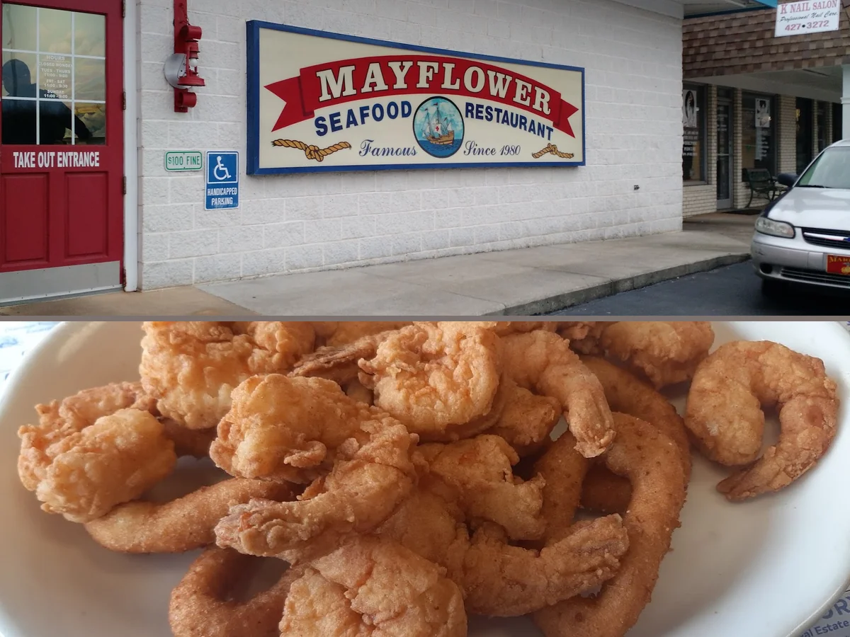 Plates of fried seafood on a casual restaurant table.